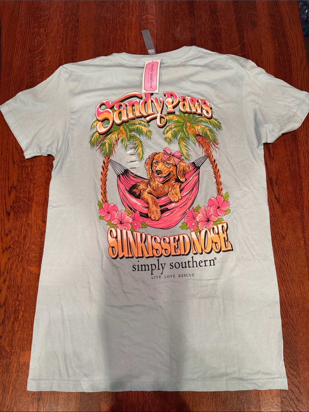 NWT Simply Southern Woman’s Pale Blue Tee with Pink Floral Chest Logo - Picture 3 of 4